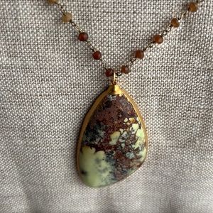 Adventurine and he’s so it’s garnet chain handmade in Los Angeles